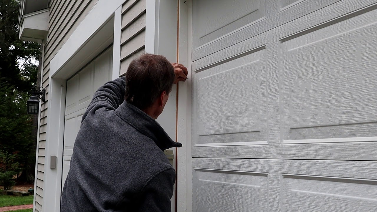 how to fix garage door gaps on sides