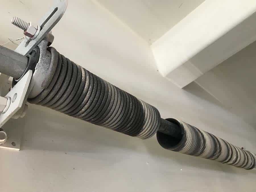 how do i replace a garage door spring