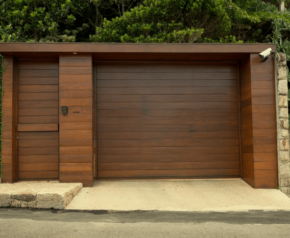 Wooden garage with pedestrian door